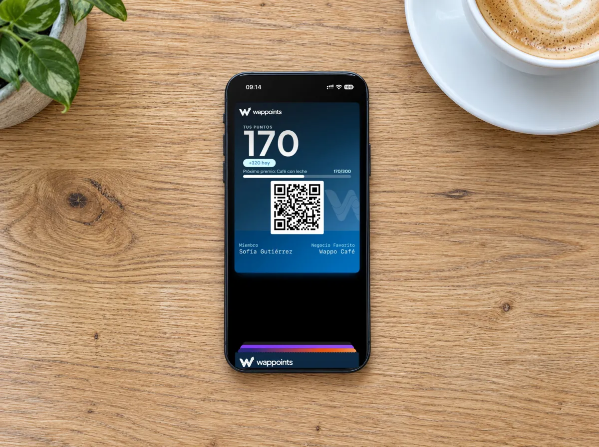 El mismo mostrador con un celular que muestra la tarjeta de Wappoints de Wappo Café: 170 puntos y su código QR.