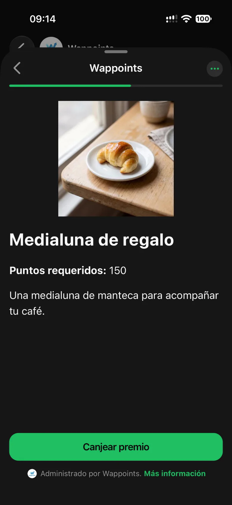 Premio «Medialuna de regalo» en el bot de WhatsApp de Wappo Café: foto de la medialuna, 150 puntos y el botón «Canjear premio».